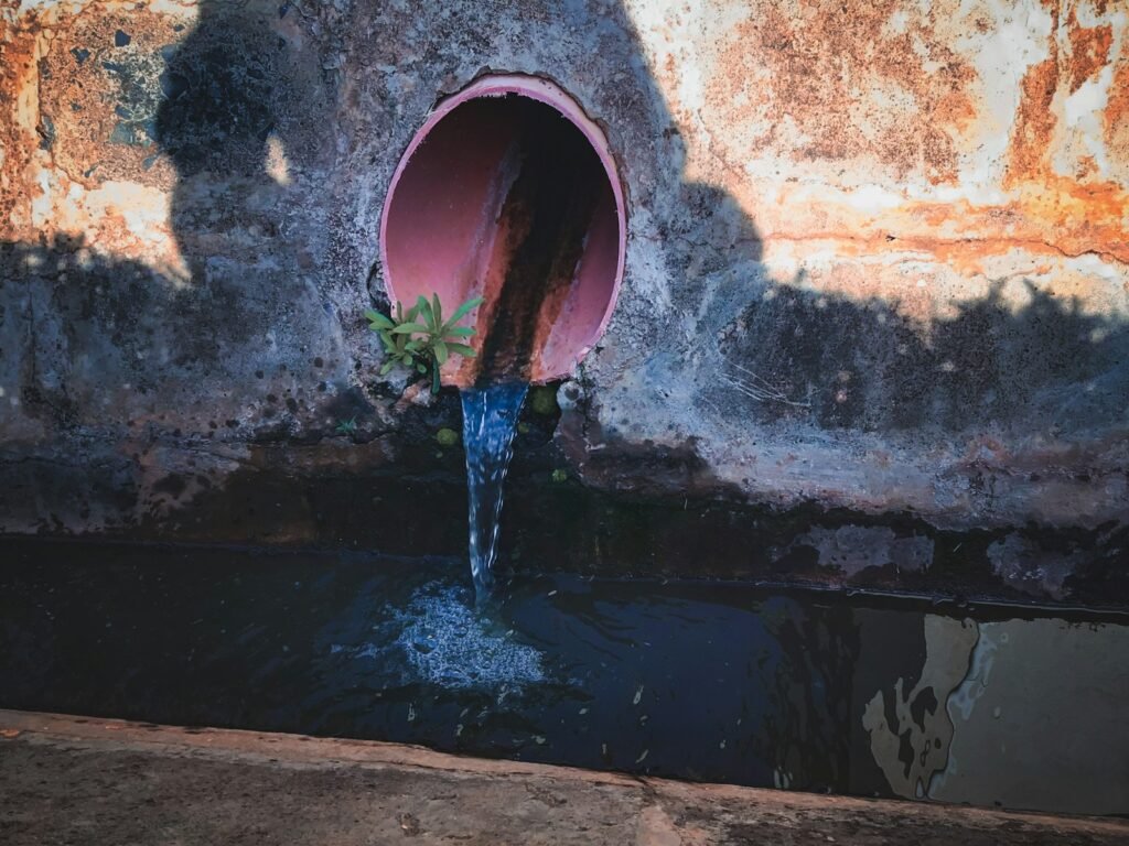 a pipe with water coming out of it